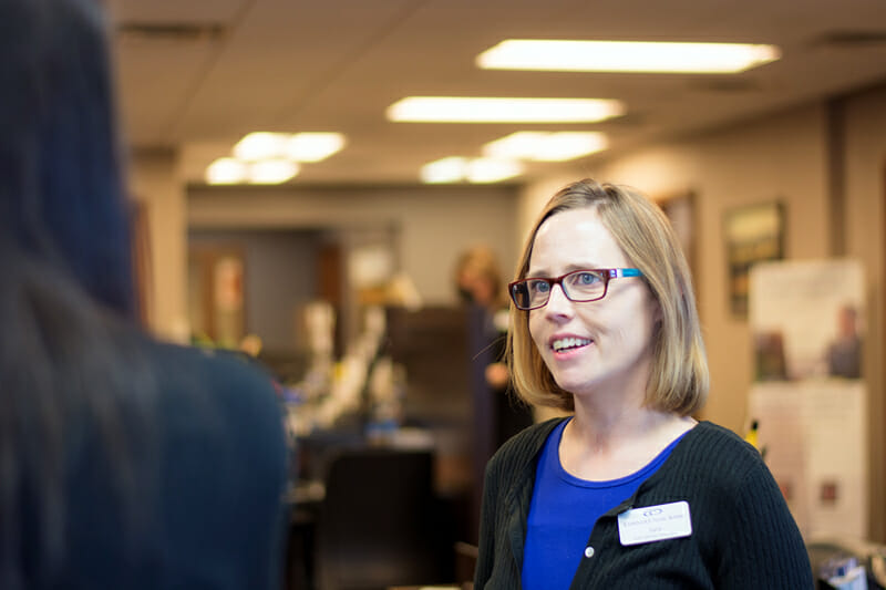 Bank teller helping a customer