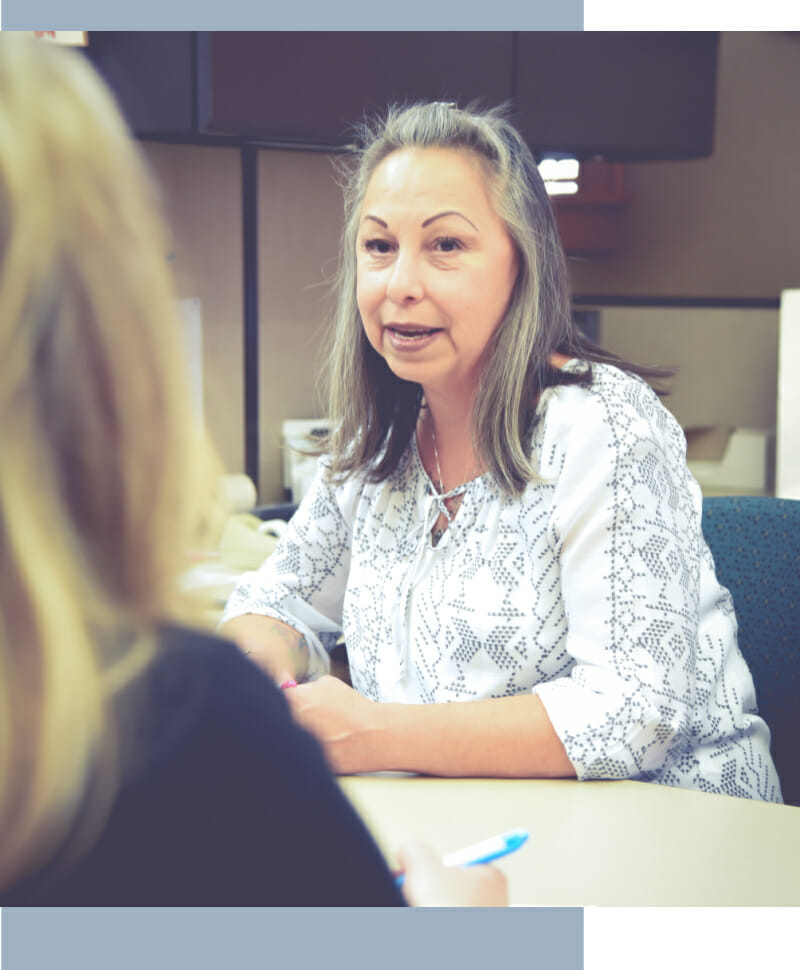 Kathy meeting with a customer