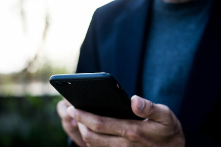 Man checking is mobile banking app