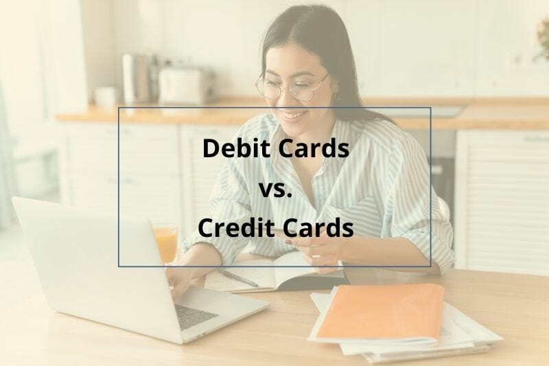 Debit cards vs. Credit Cards. Young woman online shopping