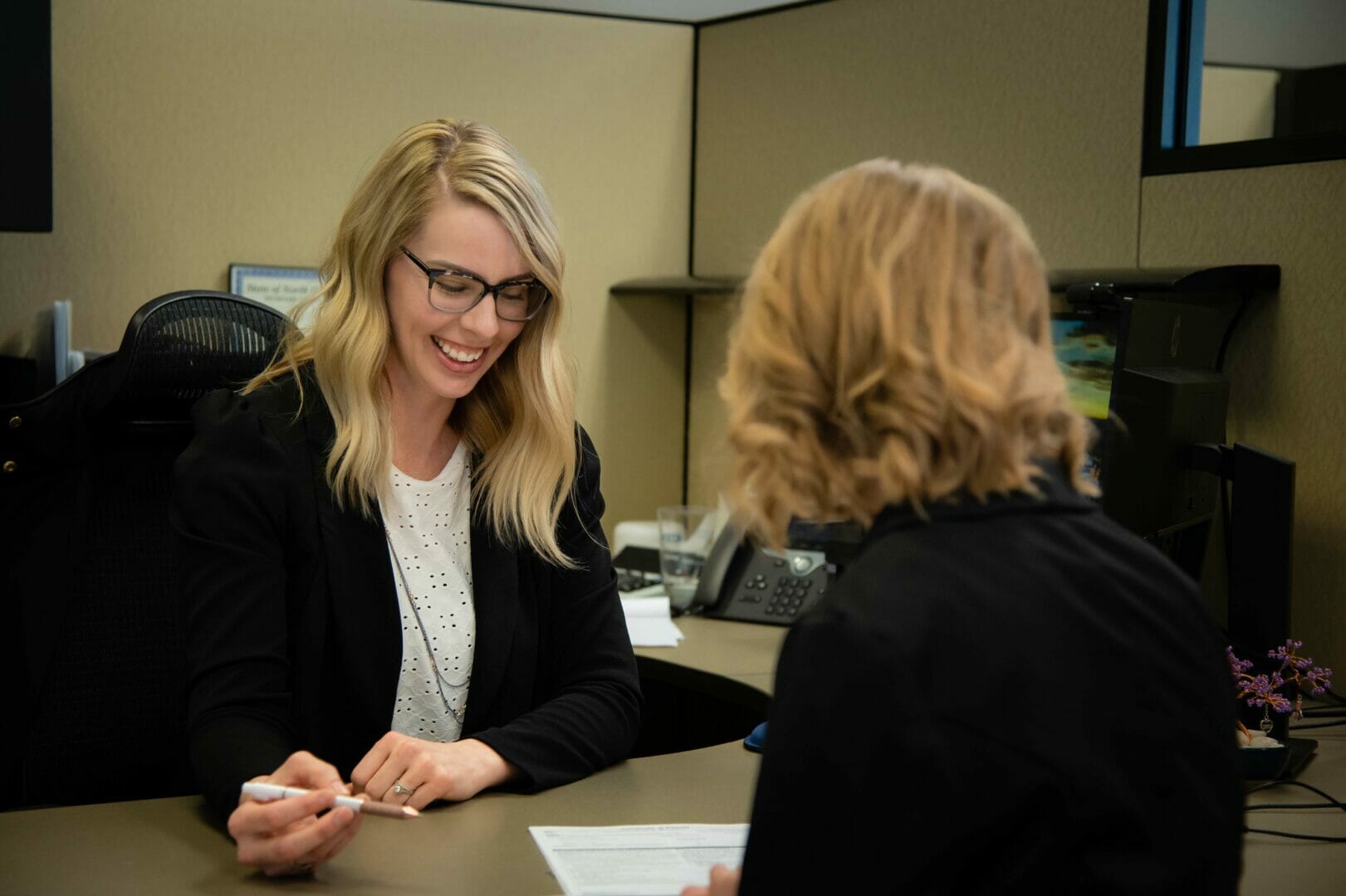 Laura helping customer