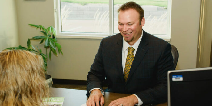 business-savings-link-01 Scott Den Boer helping a customer